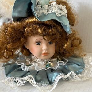 Elegant Porcelain Doll with Blue Dress